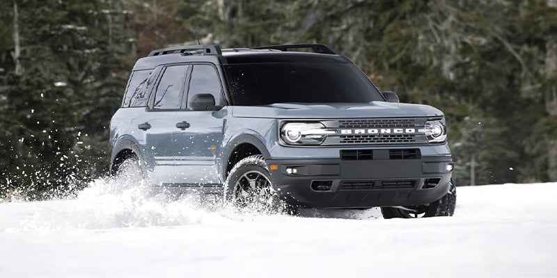 Ford Bronco Sport driving on a snowy trail