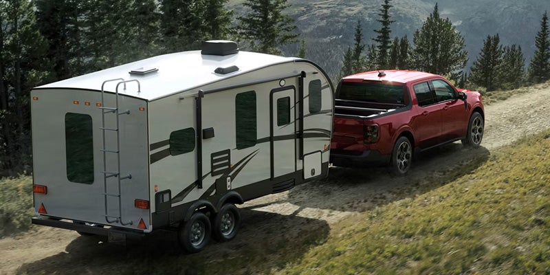 2026 Ford Maverick towing a small camper
