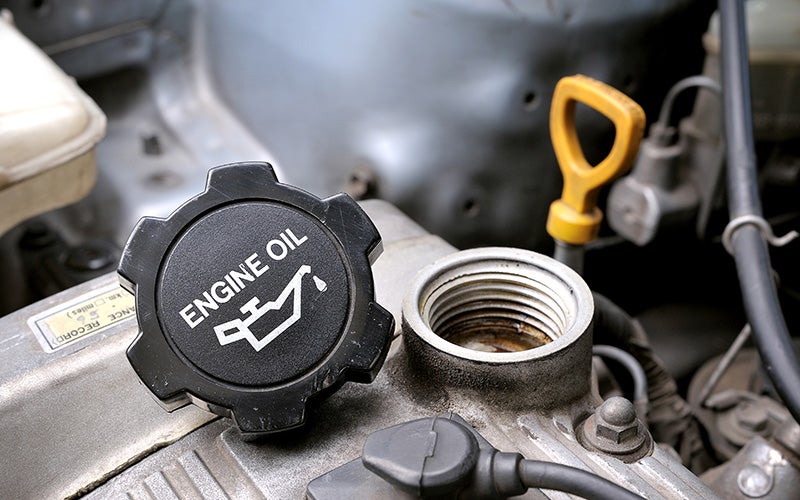 Ford engine oil cap during an engine oil service
